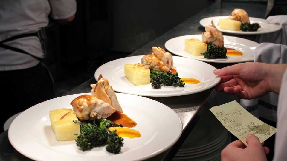 plates lined up in the kitchen